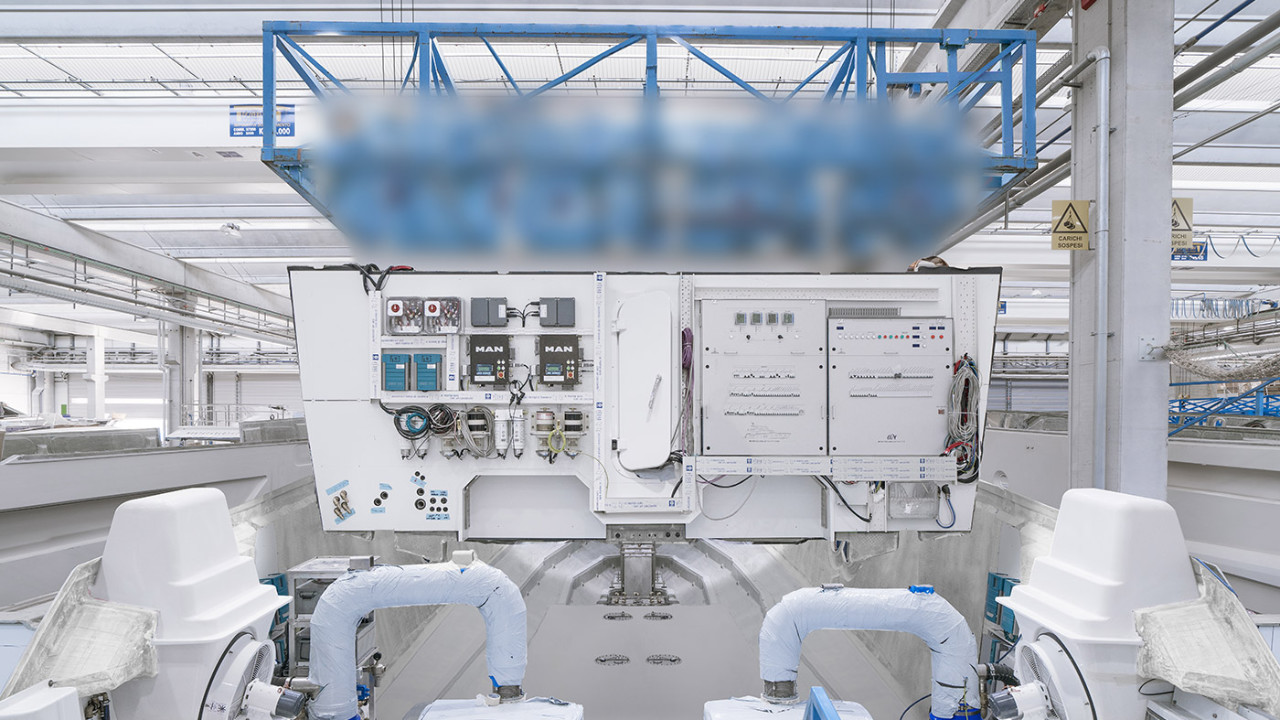 The interior module is lowered into the hull in a single action.