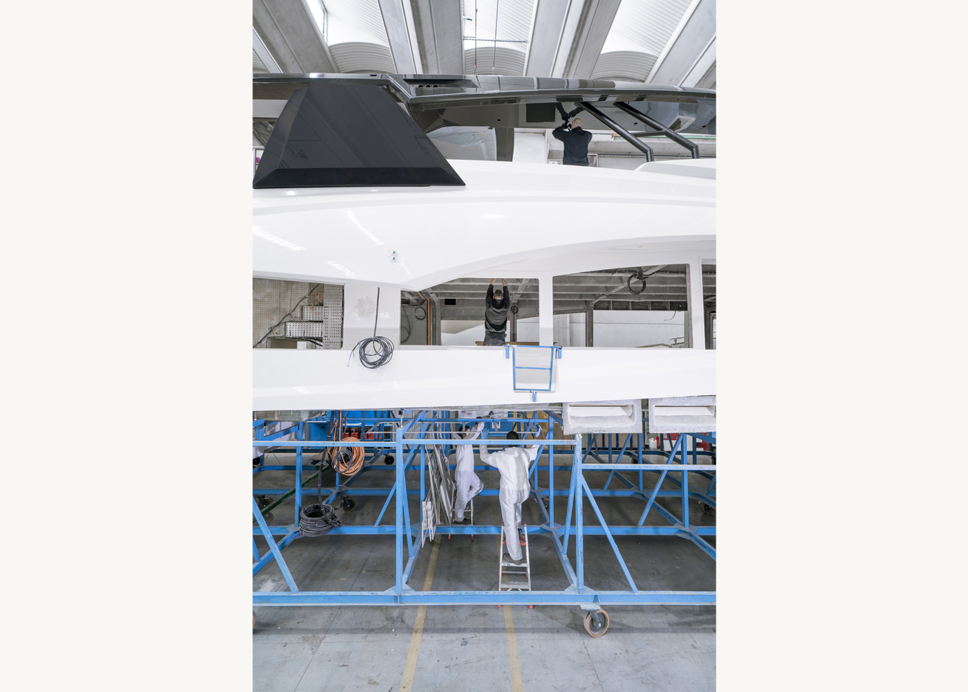 The deck joined with the superstructure, the flybridge framework and the carbon fiber t-top.