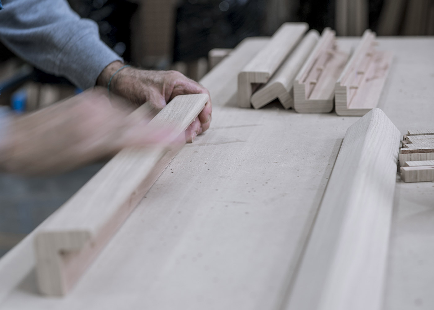 A piece of solid wood shaped by hand.